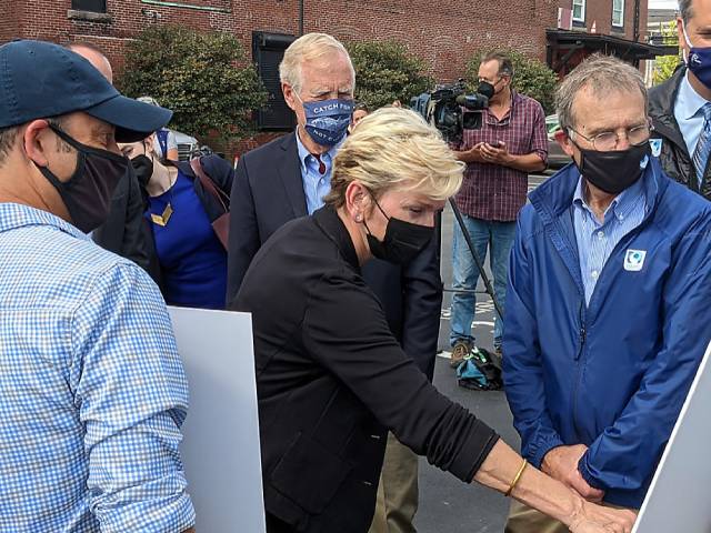 Energy Secretary touts federal renewable-energy funding in visit to Portland hydropower firm